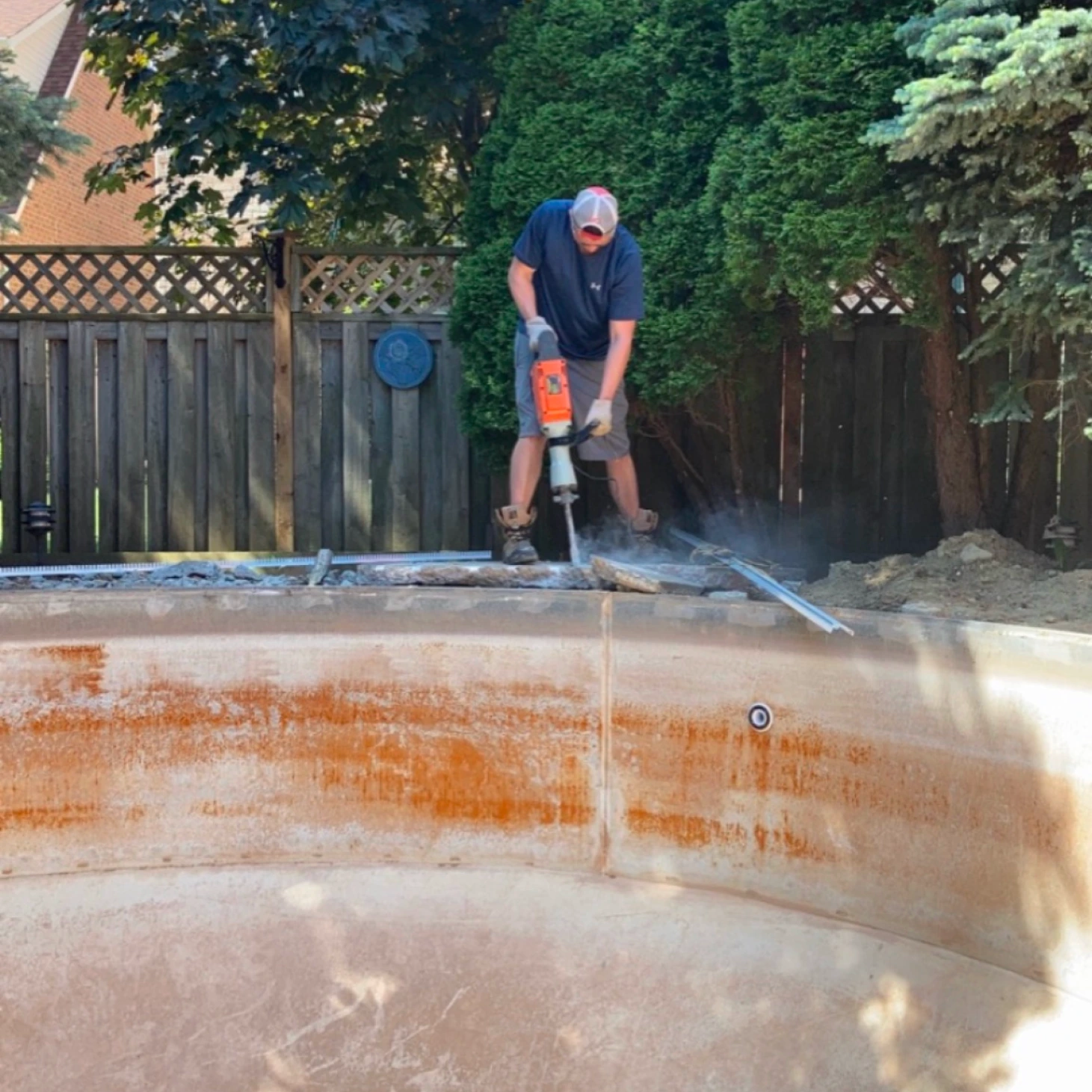 A person working on a pool construction